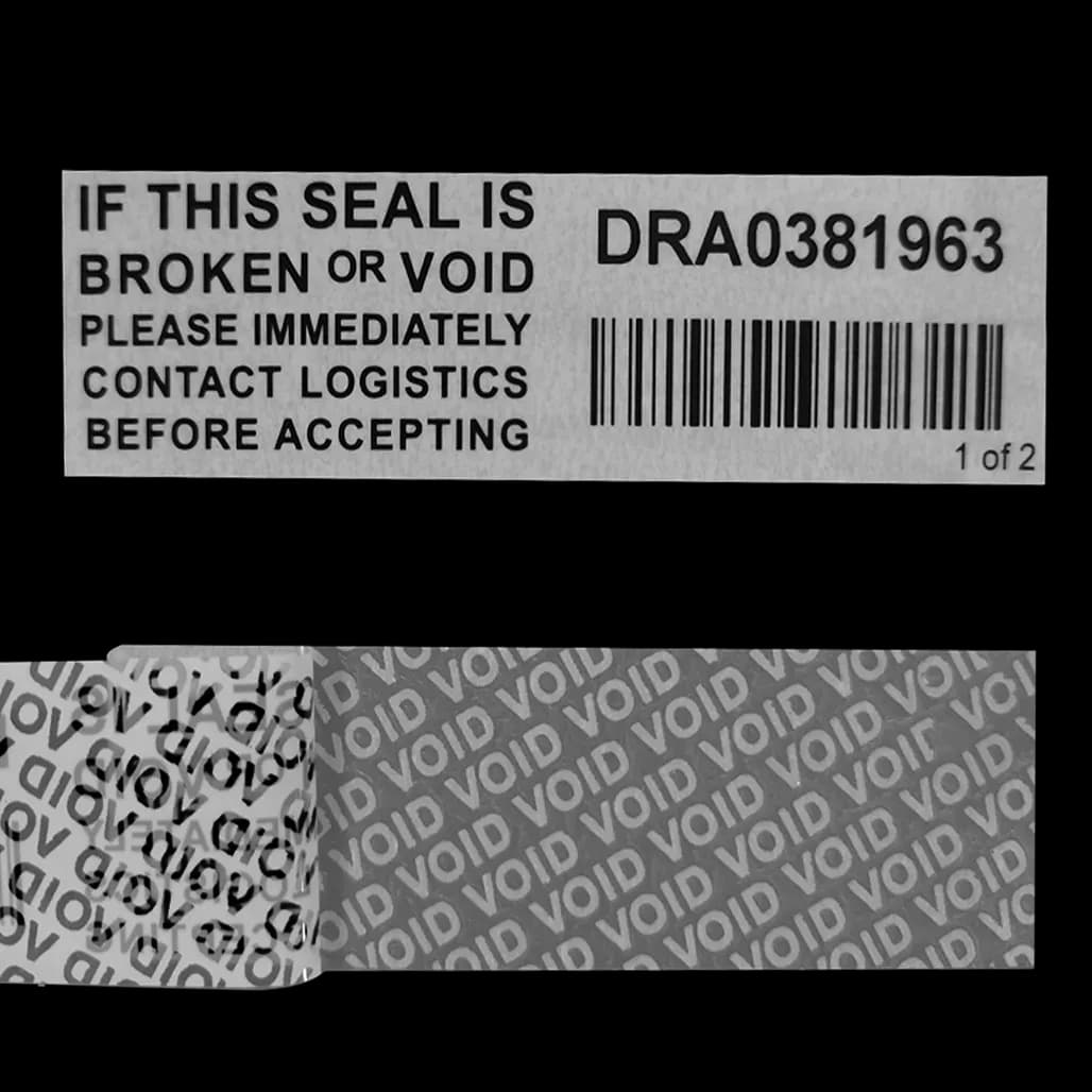 Tamper evident label with OPEN VOID backing partially revealed