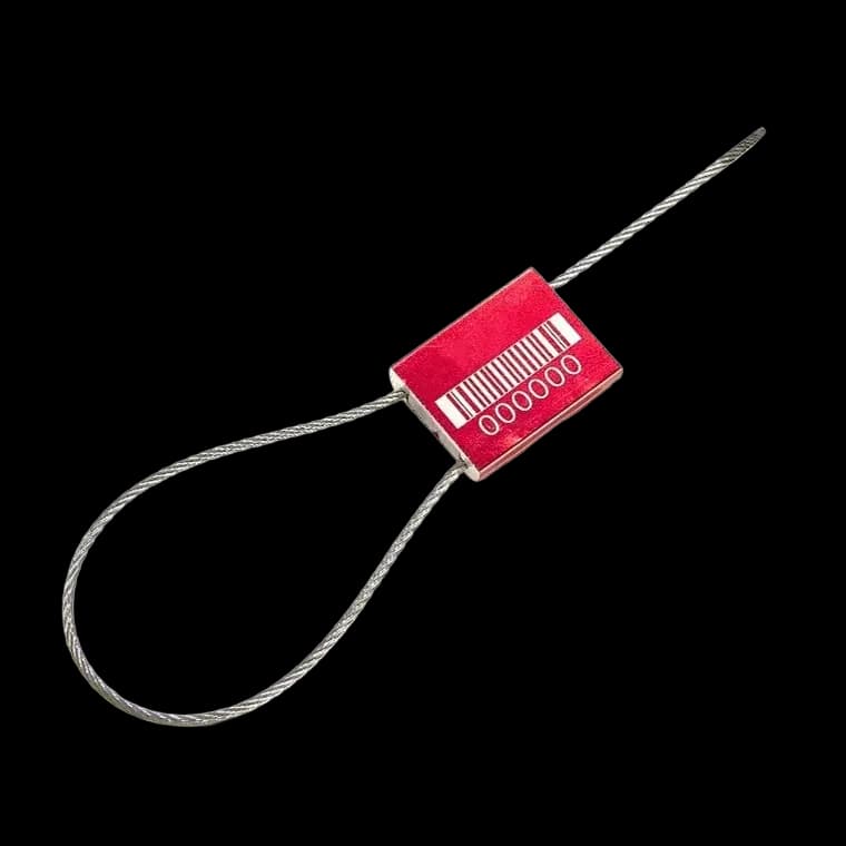 TRCABLE_1 cable seal with red aluminum body, printed serial number and barcode, sealed, top-angled view.