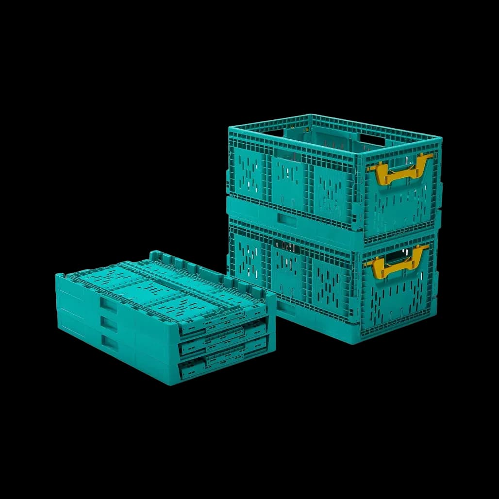 Collapsible green crates, one folded flat and one erected